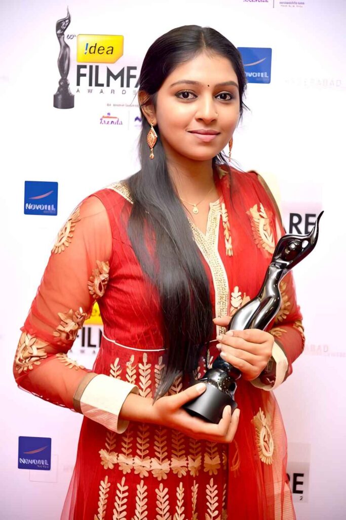 Lakshmi Menon receiving Filmfare Award for Tamil cinema
