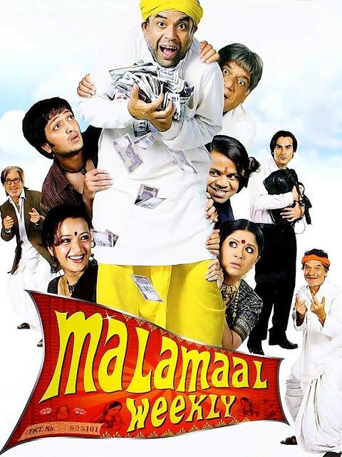 Malamaal Weekly (2006) movie poster showing Paresh Rawal, Riteish Deshmukh, and the ensemble cast in a rural comedy setting.