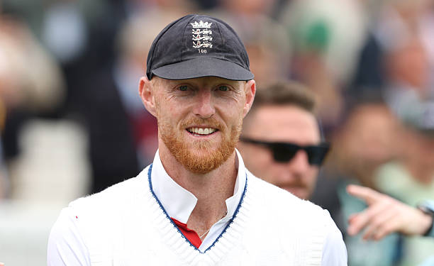England cricket star Ben Stokes smiling on the field while wearing his team cap, highlighting a memorable chapter in the Story of Ben Stokes.