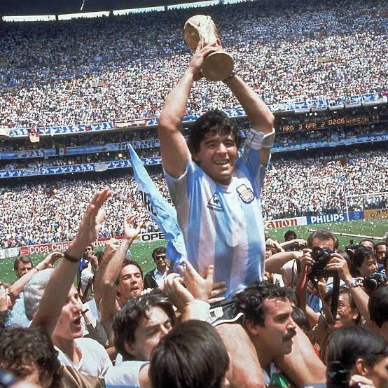 Diego Maradona lifts the FIFA World Cup trophy after leading Argentina to become FIFA World Cup winners in 1986.