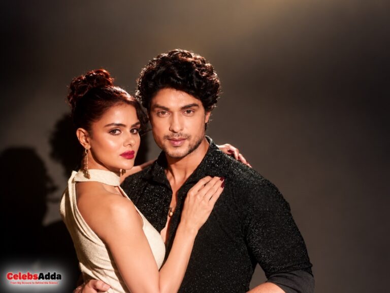 Priyanka Chahar Choudhary and Ankit Gupta posing together in a glamorous portrait